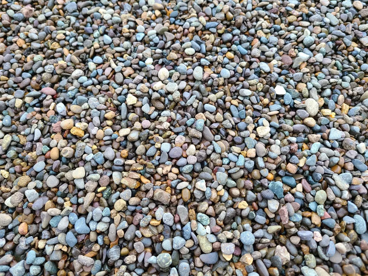 Pile of blue-gray pea gravel available for delivery from WB Group