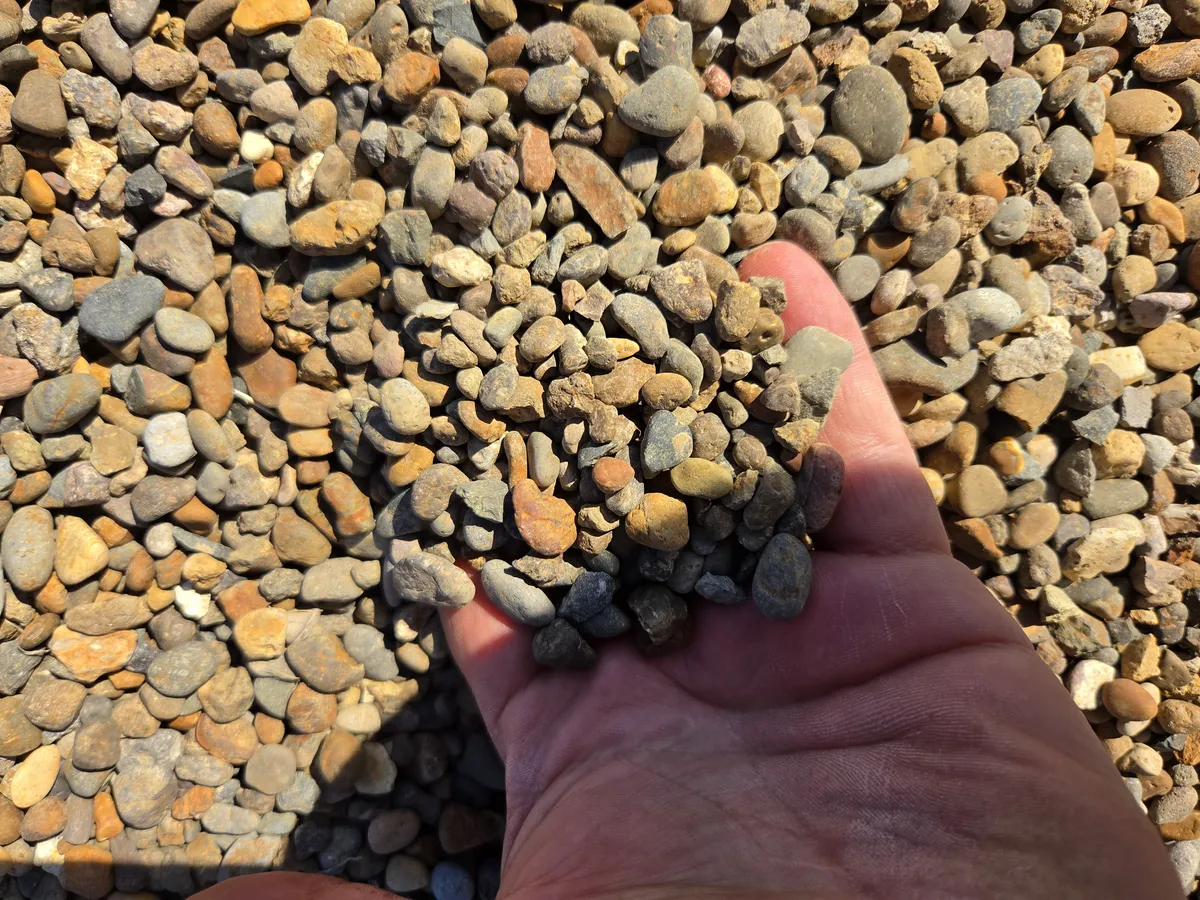 Handful of pea gravel from WB Group