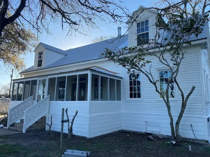 painter painting exterior house