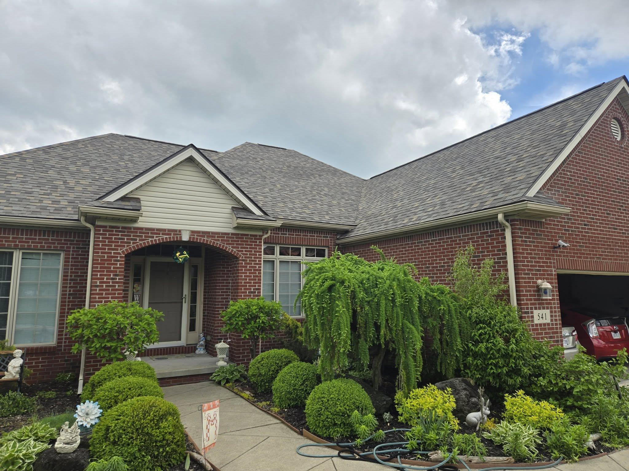 a roof with a few shingles