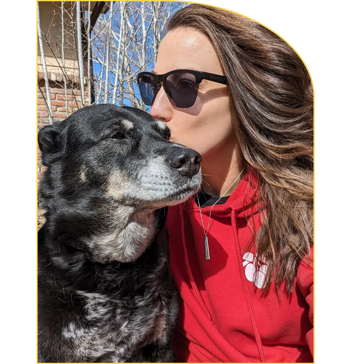 Brittany Silva kissing her dog Sophie