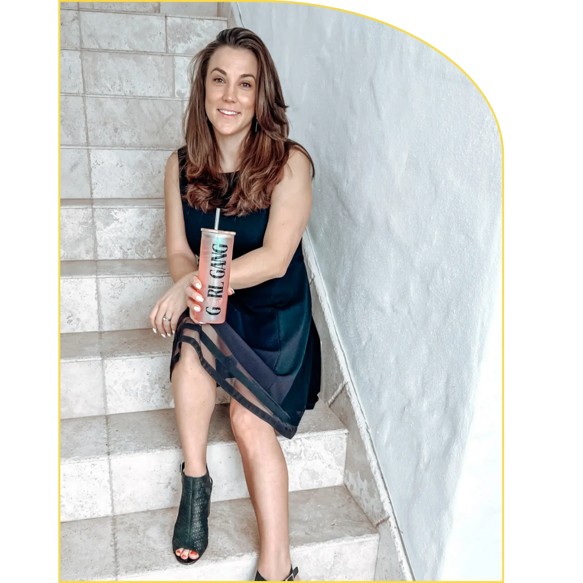 Brittany Silva with beneve glass on stairs