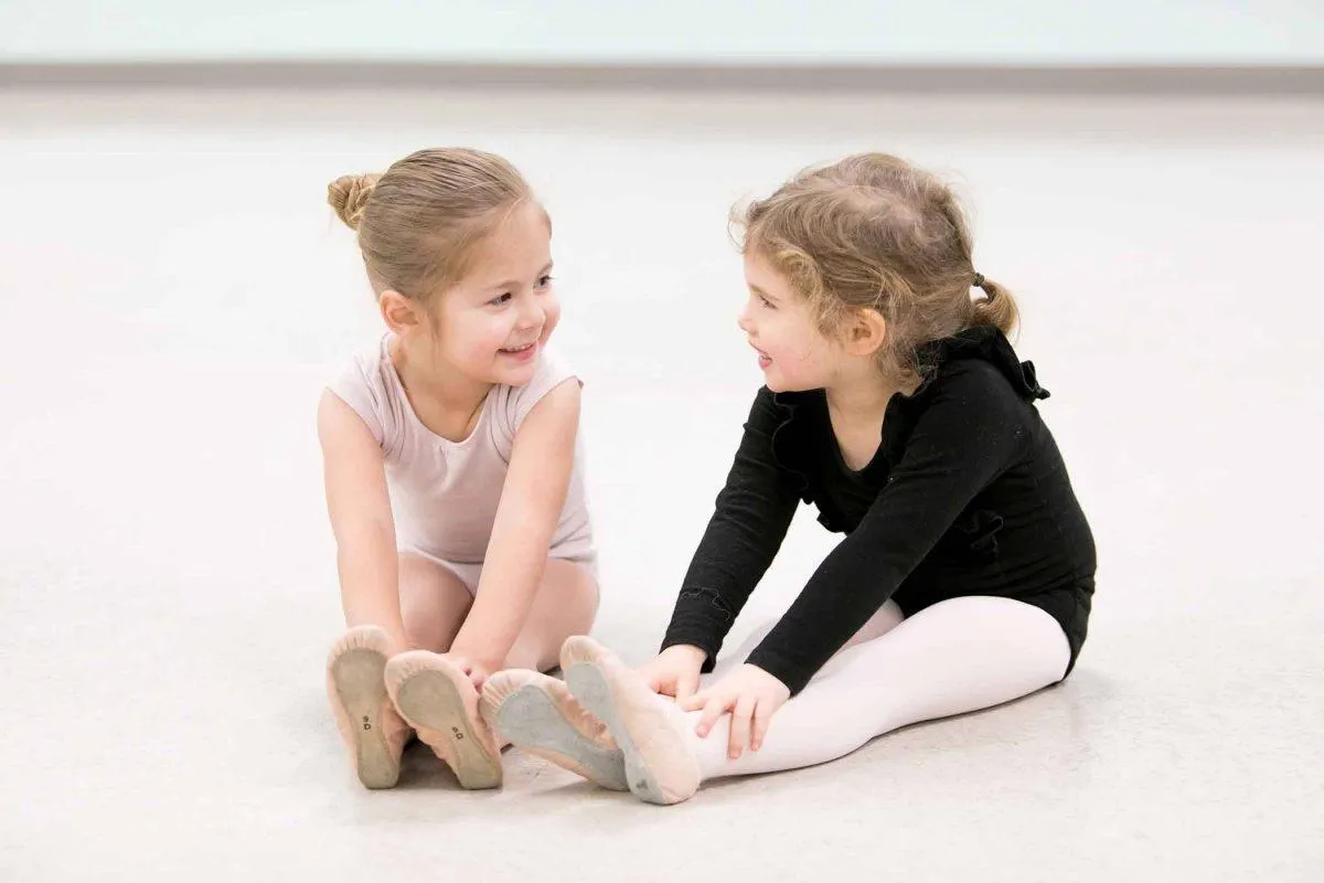 Two kids are dancing