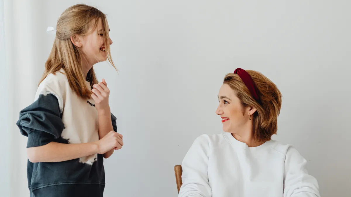 A calm and connected interaction between parent and child, reflecting emotional safety, regulation, and secure attachment.