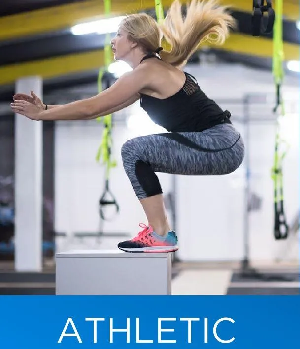 woman carrying barbell