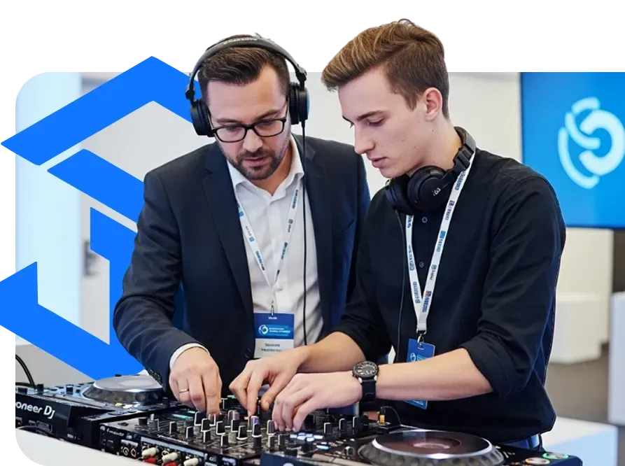 Confident DJ professional wearing headphones and holding a laptop controller