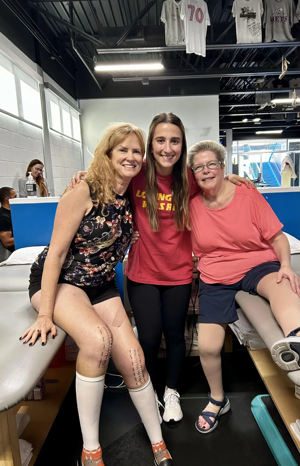 Diana smiling with friends at rehab after double knee replacement