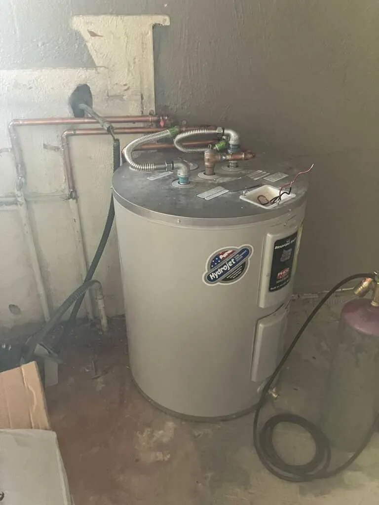 Water Heater repair in a home.