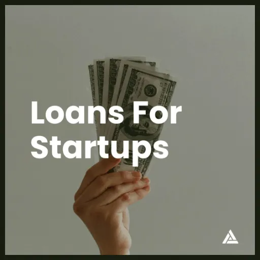 Image hand holding cash with Loans for Startups text