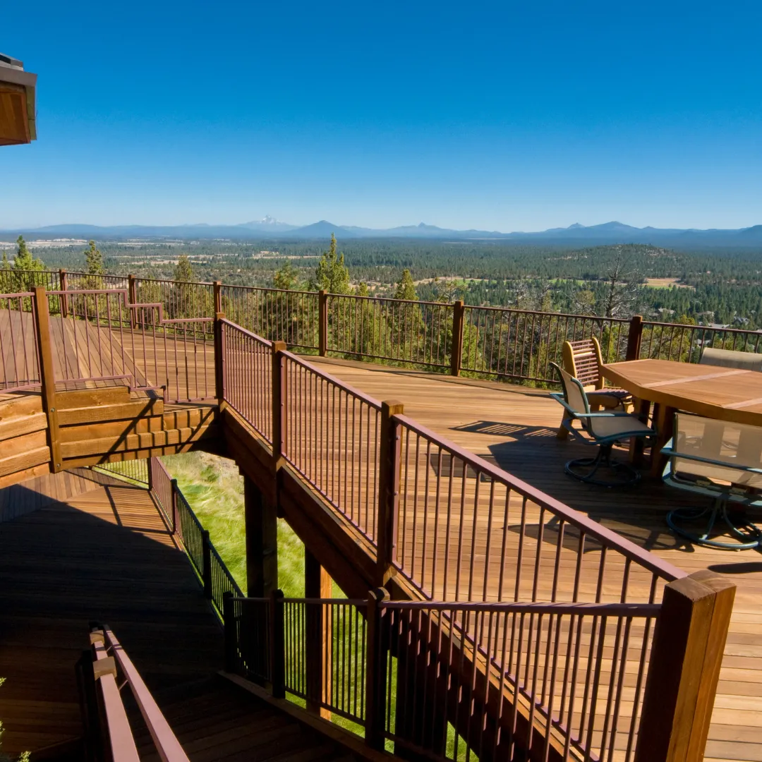 Multi-level deck with integrated fence for privacy and outdoor living