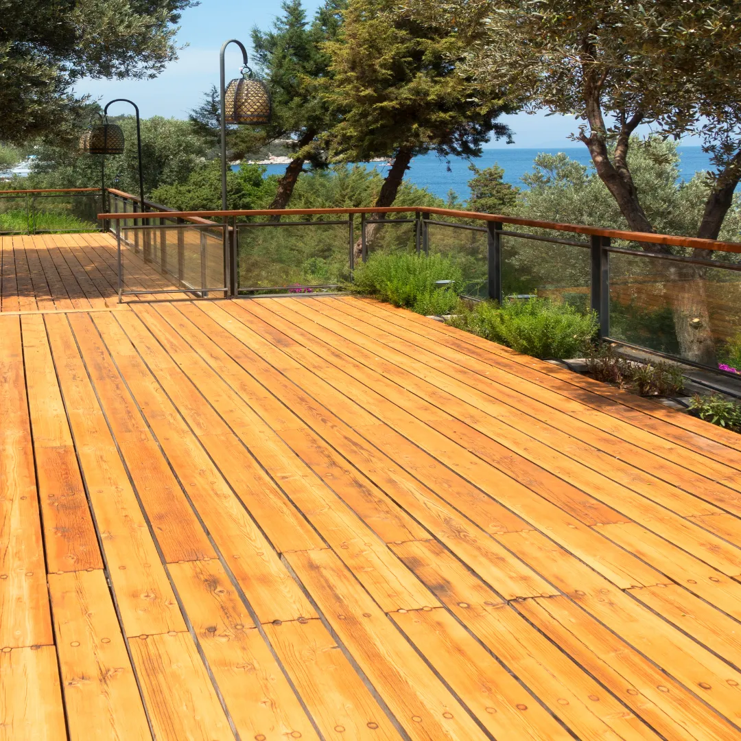 Material coordination for cohesive deck and fence combination construction