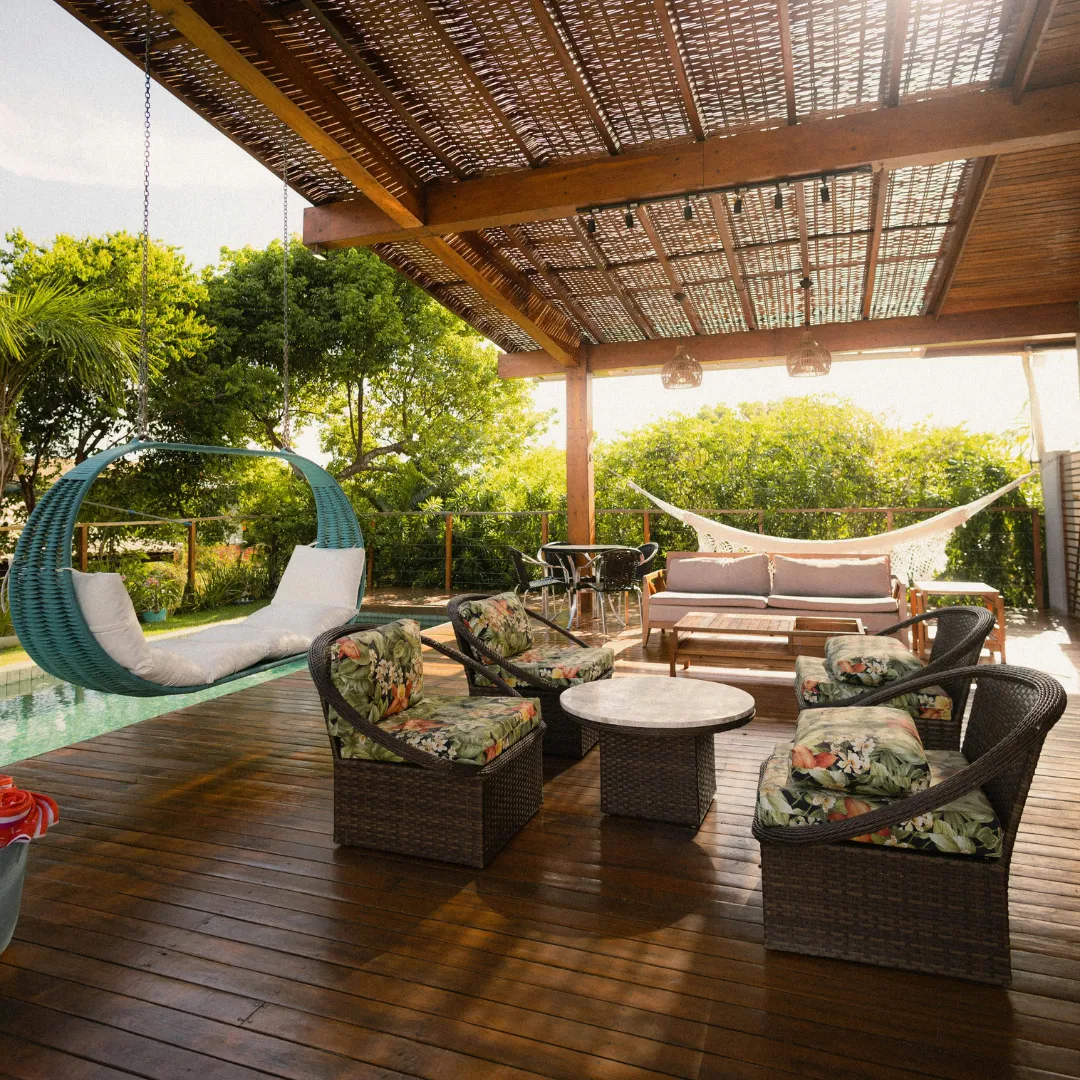 Backyard entertainment space with deck and fence combination for outdoor living