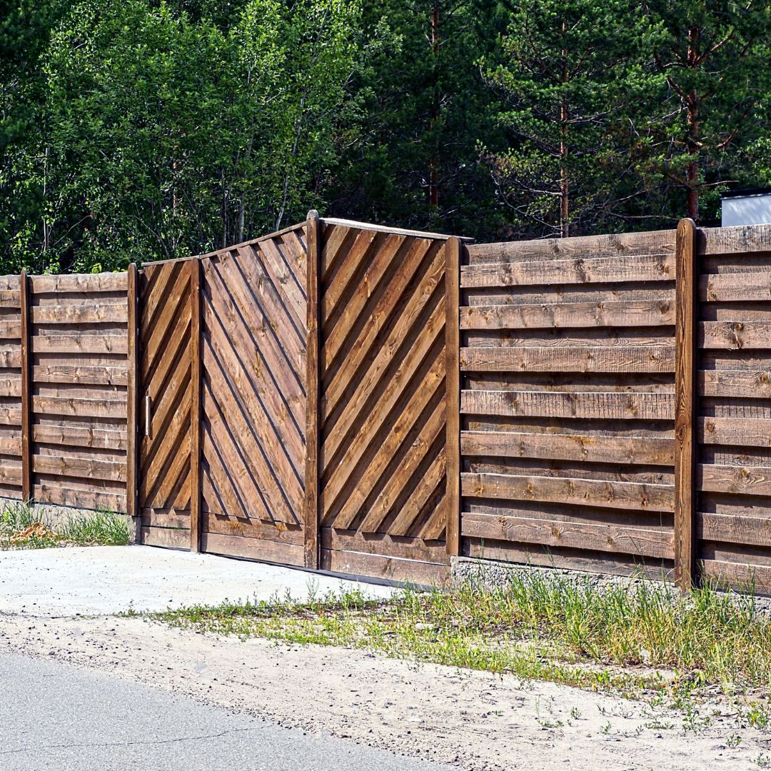 Wood fence replacement services by BuiltWell Grop
