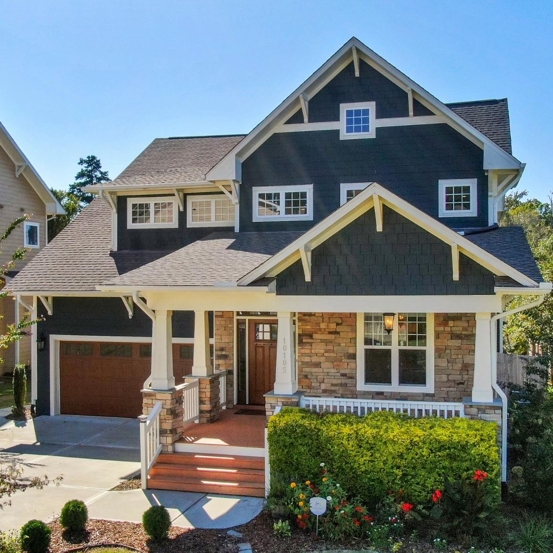 Power washing and surface preparation for exterior home painting