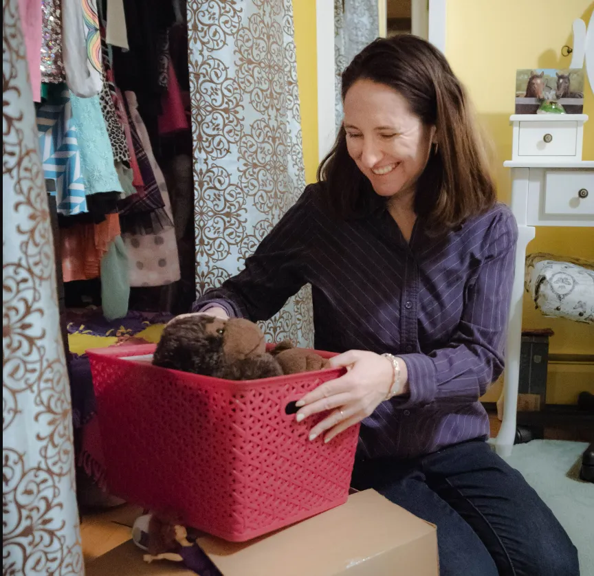 working session - organizer katie mcallister working in a girl's closet