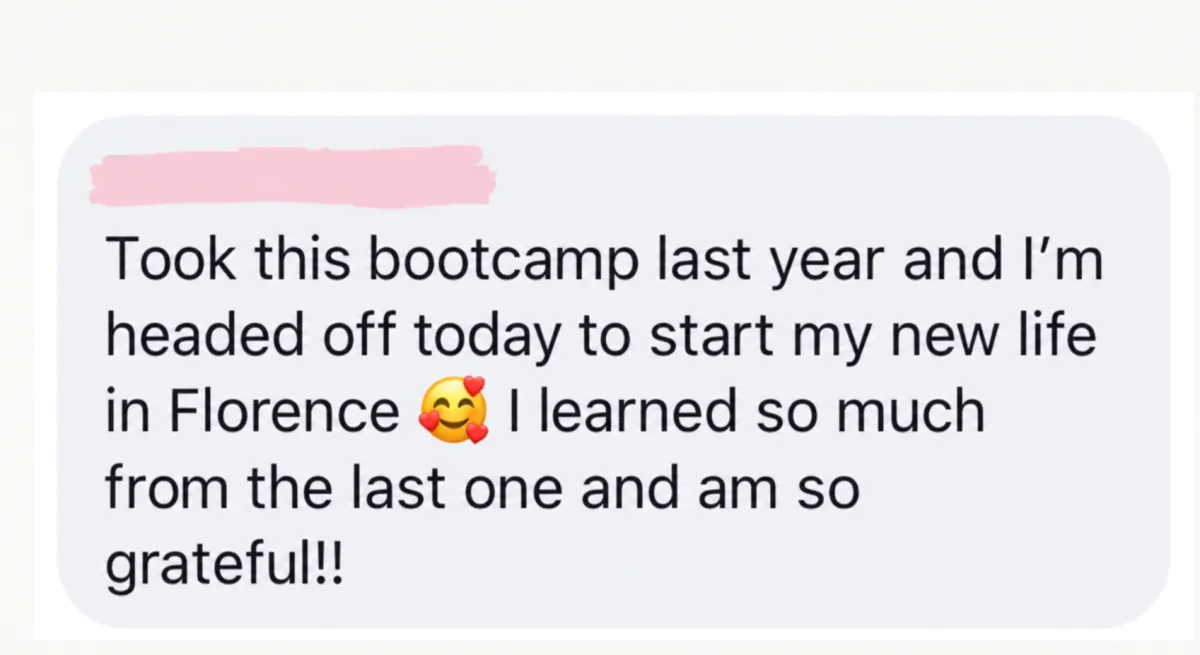 Bootcamp member selfie toast with wine glass overlooking a Mediterranean sunset