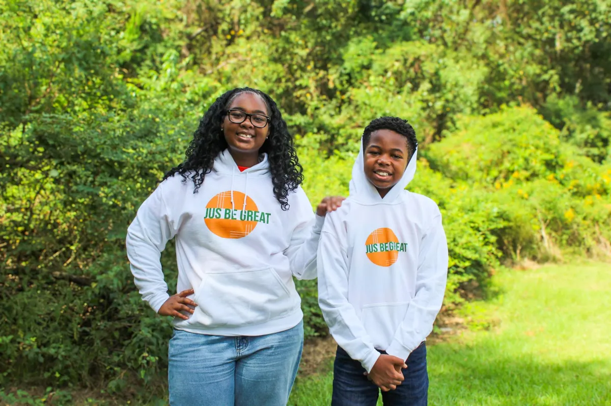 A man and a woman standing next to each other