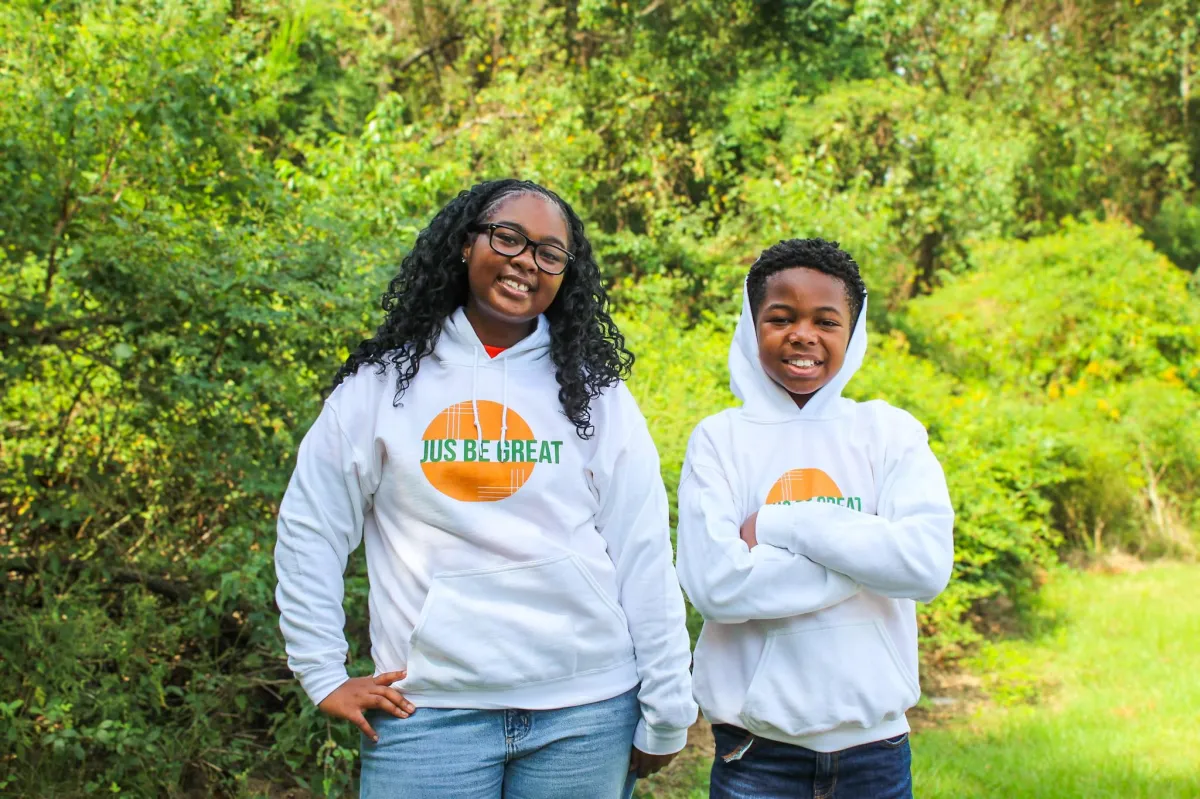 A man and a woman standing next to each other