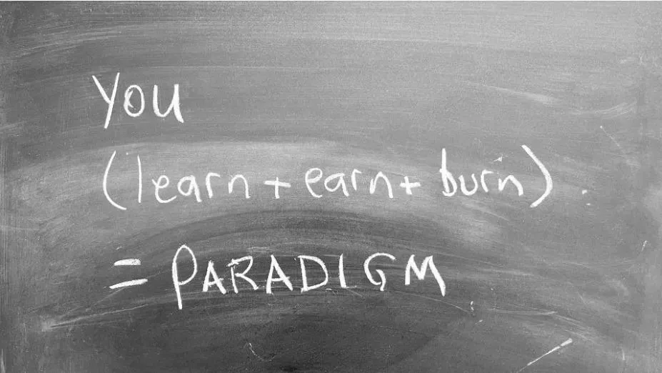 Yu (learn + earn burn) = paradigm written on chalk board