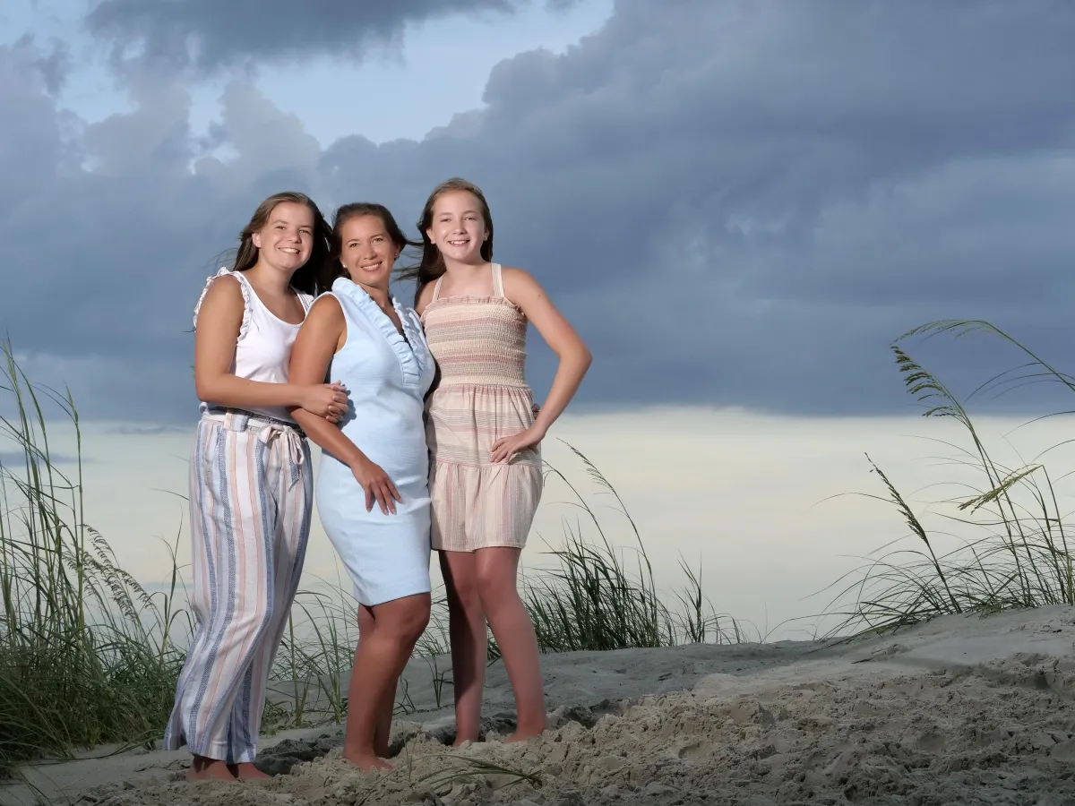 Hilton Head family beach portrait of mother and two teenage daughters in natural coastal setting