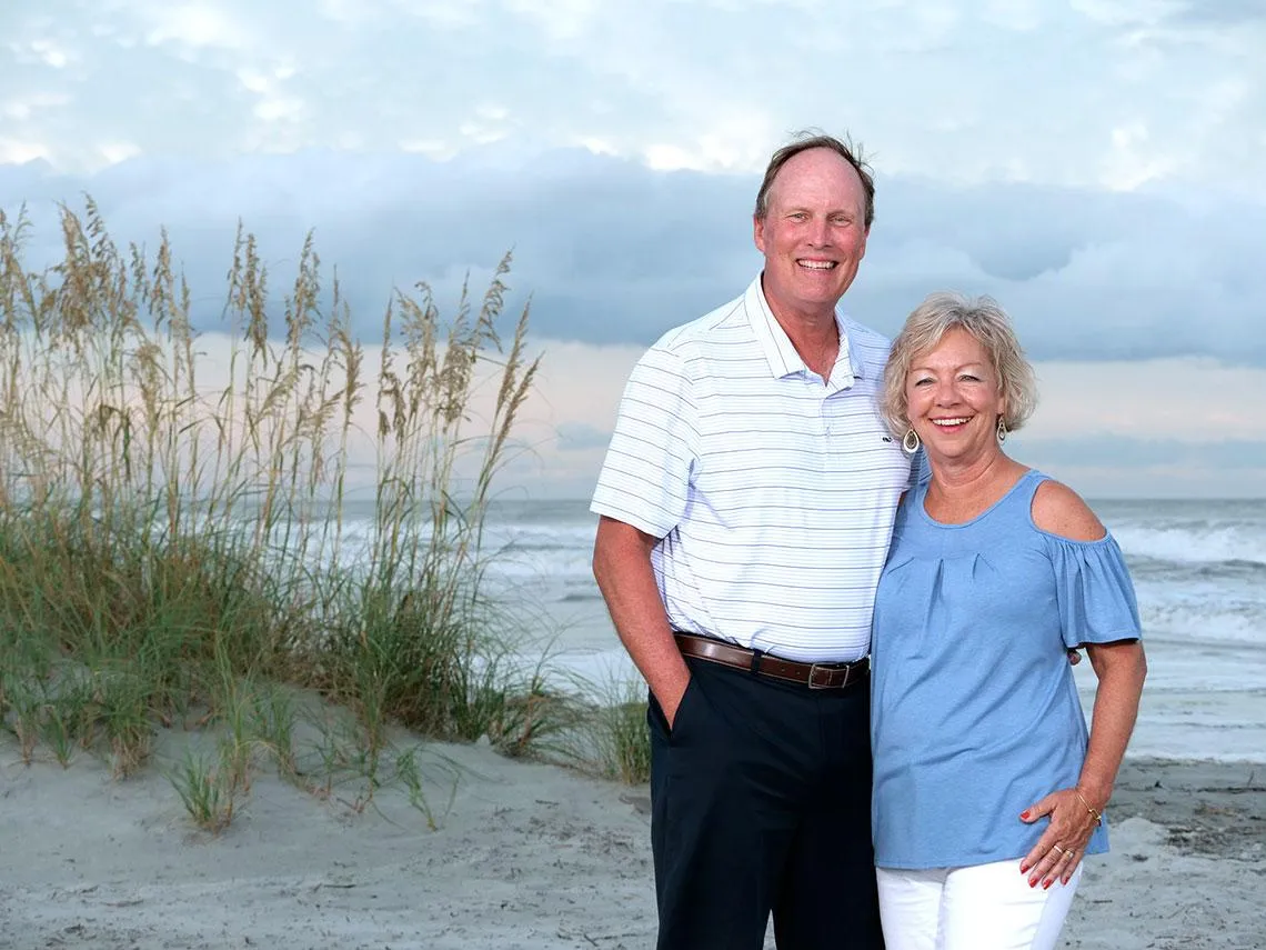Grandparents photographed on Hilton Head beach during multigenerational family portrait session