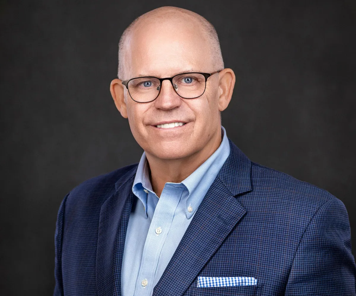 Studio headshot of client highlighting positive photography experience