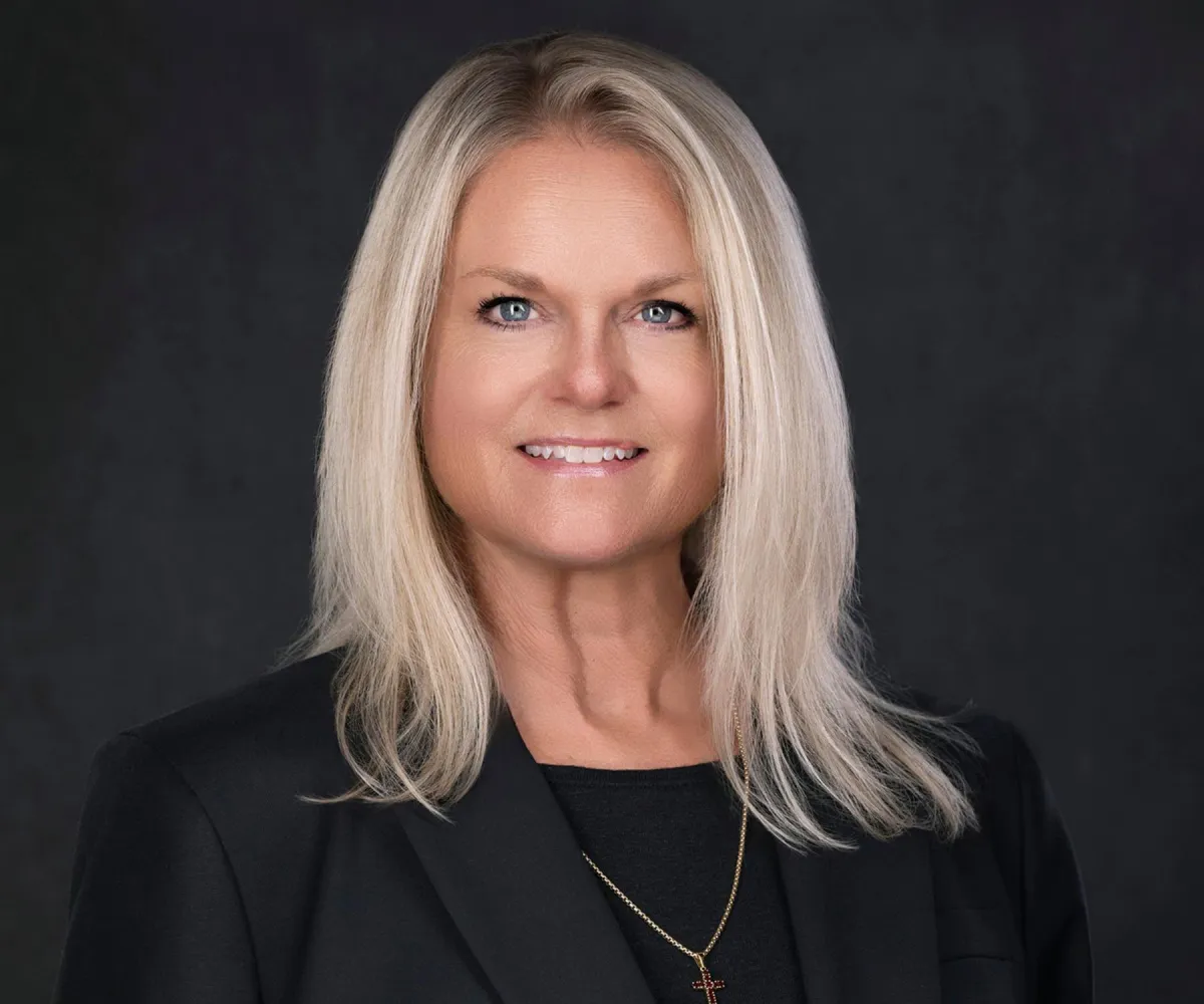 Client headshot paired with testimonial about professional image update