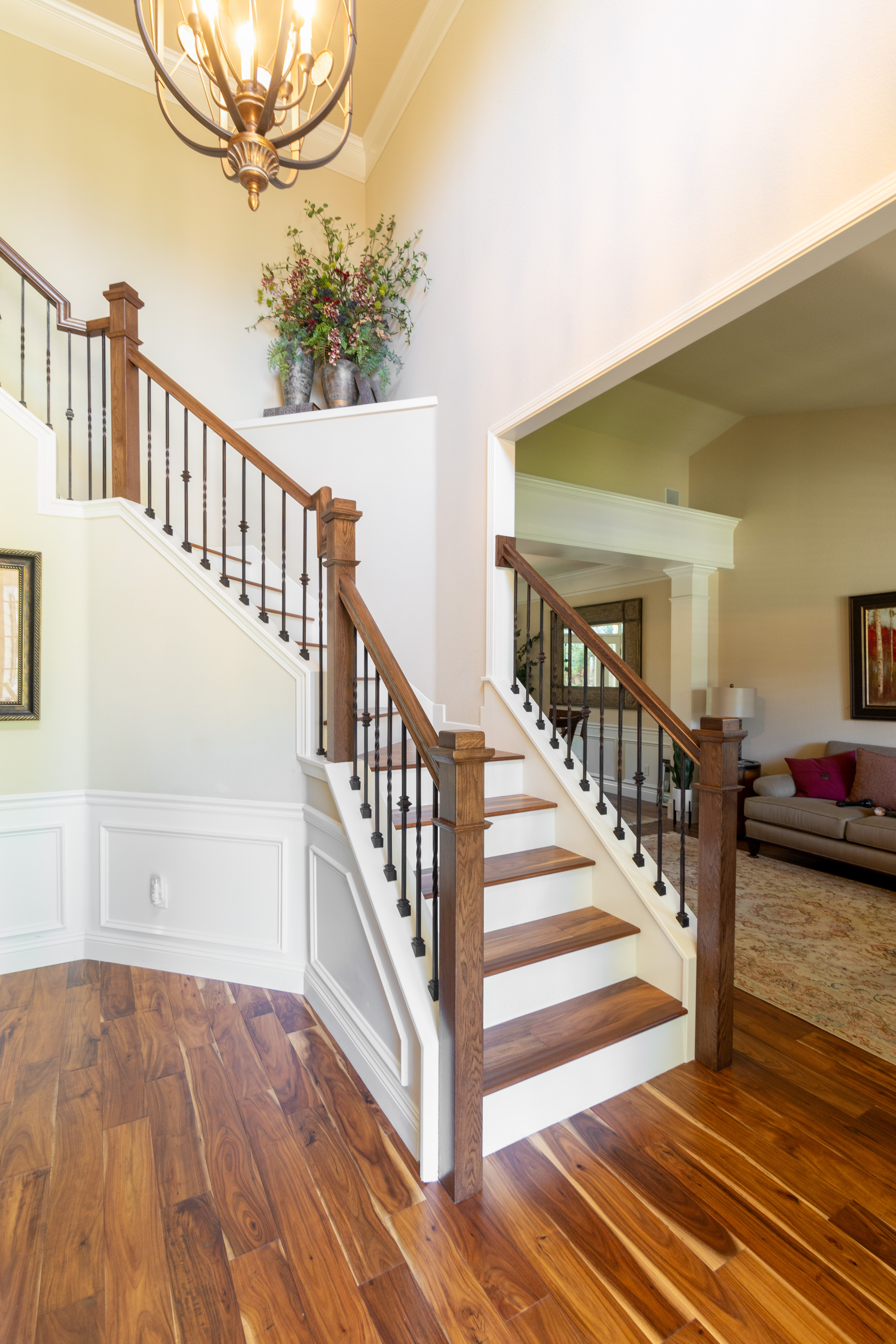 Remodeled staircase with iron balusters and wood treads in Roseville, CA