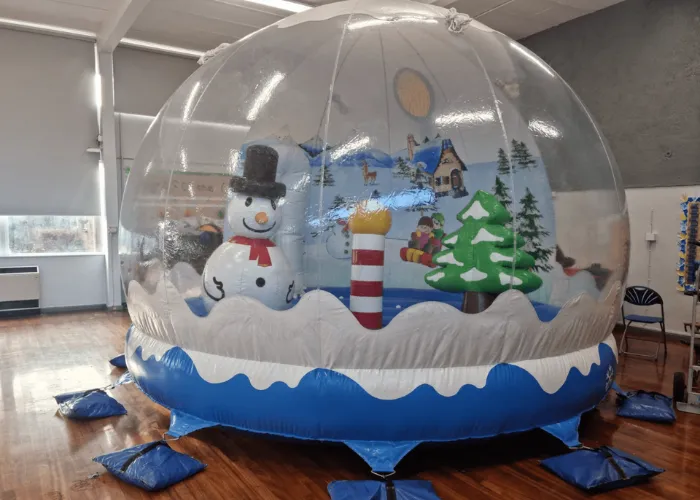 Inflatable christmas snow globe that has been hired in Newport