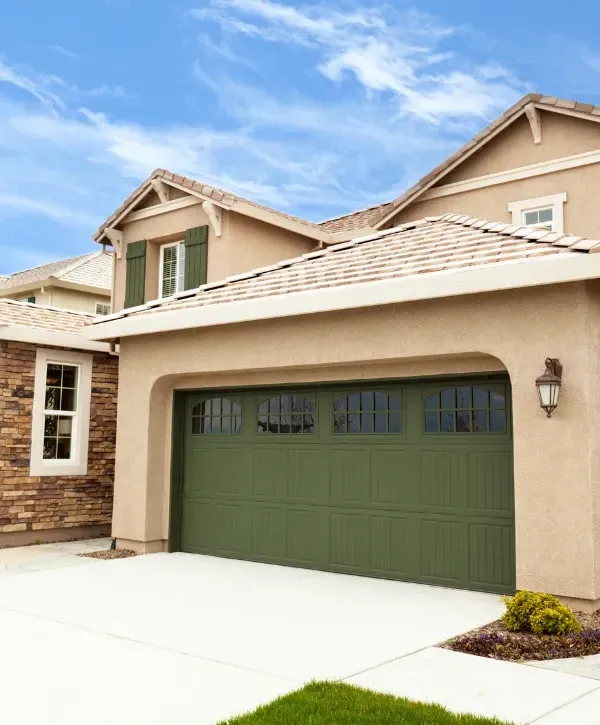 Basic concrete driveway outside a suburban home