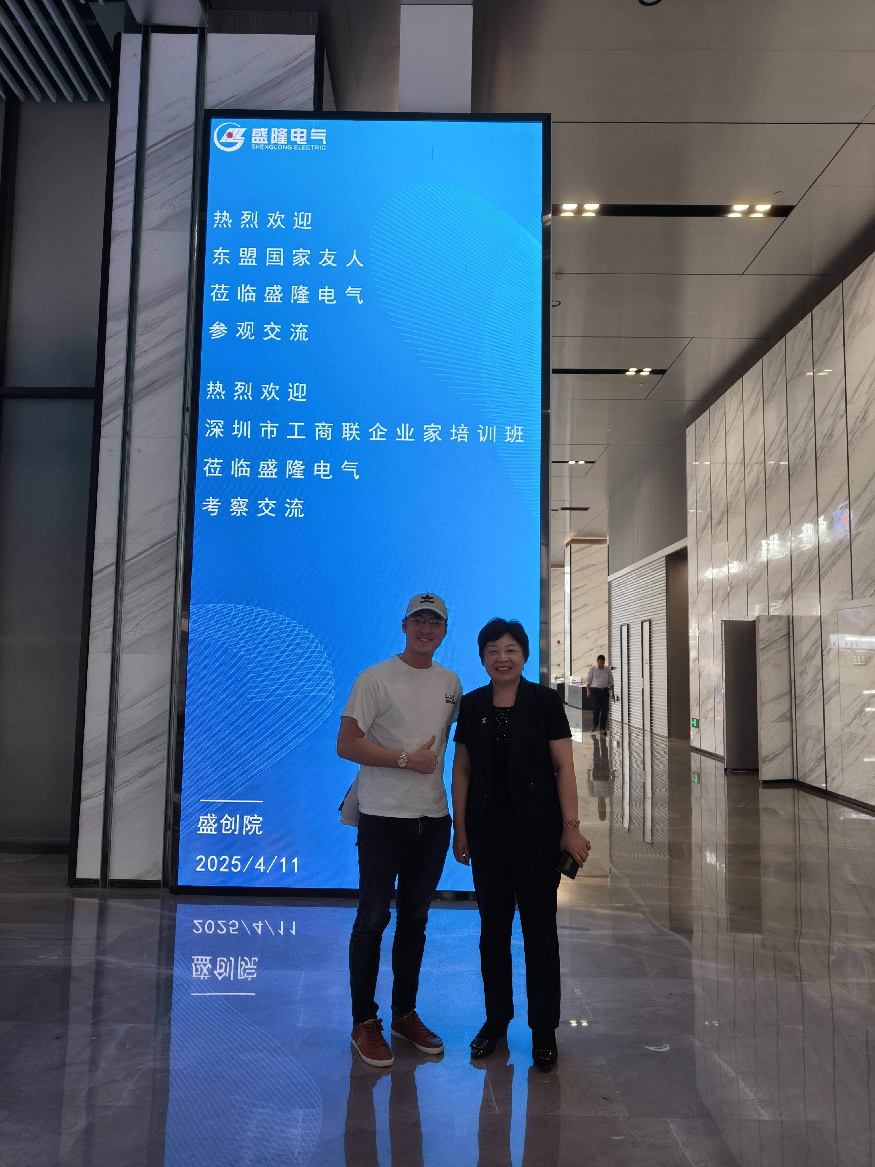 Alaric Ong with the Vice Chairman of Sheng Long Electric