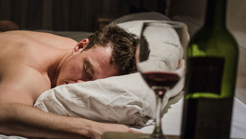 silhouette of woman raising her right hand