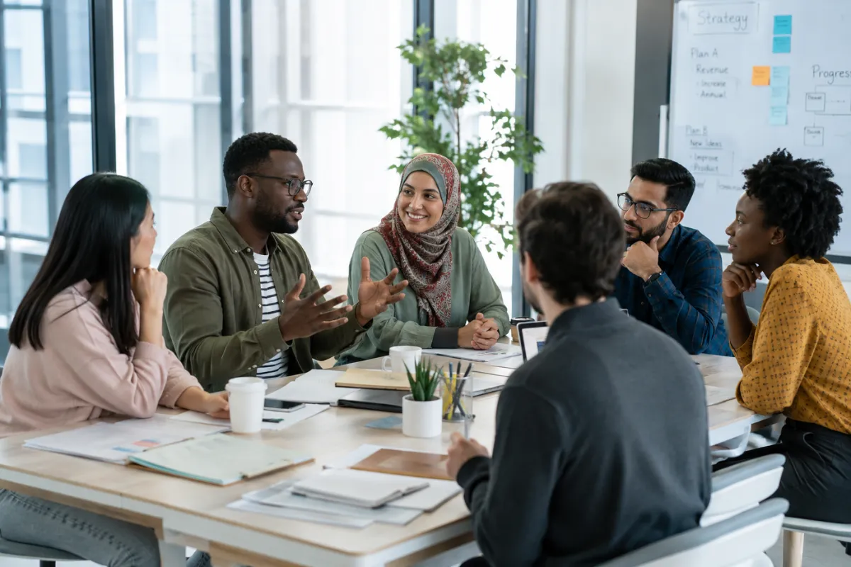 Inclusive expatriate adapting to local culture and promoting workplace inclusion.