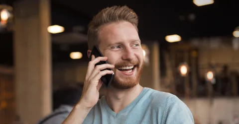 smiley man on phone call