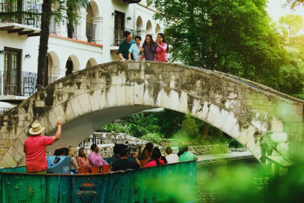 family posing o Selena's bridge
