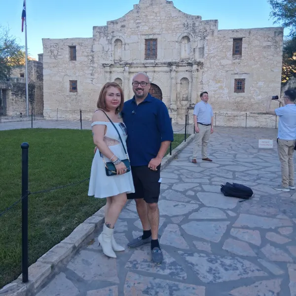 on a walking tour in front of the Alamo