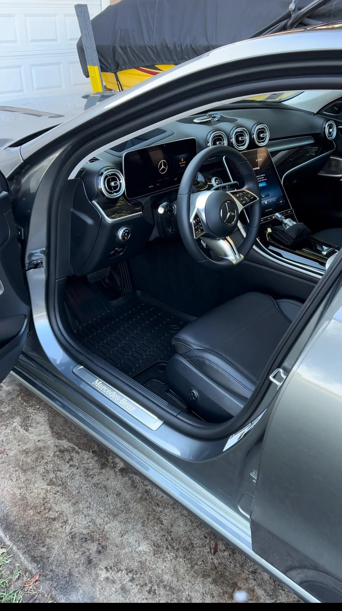 Clean and shiny Porsche leather steering wheel and red interior