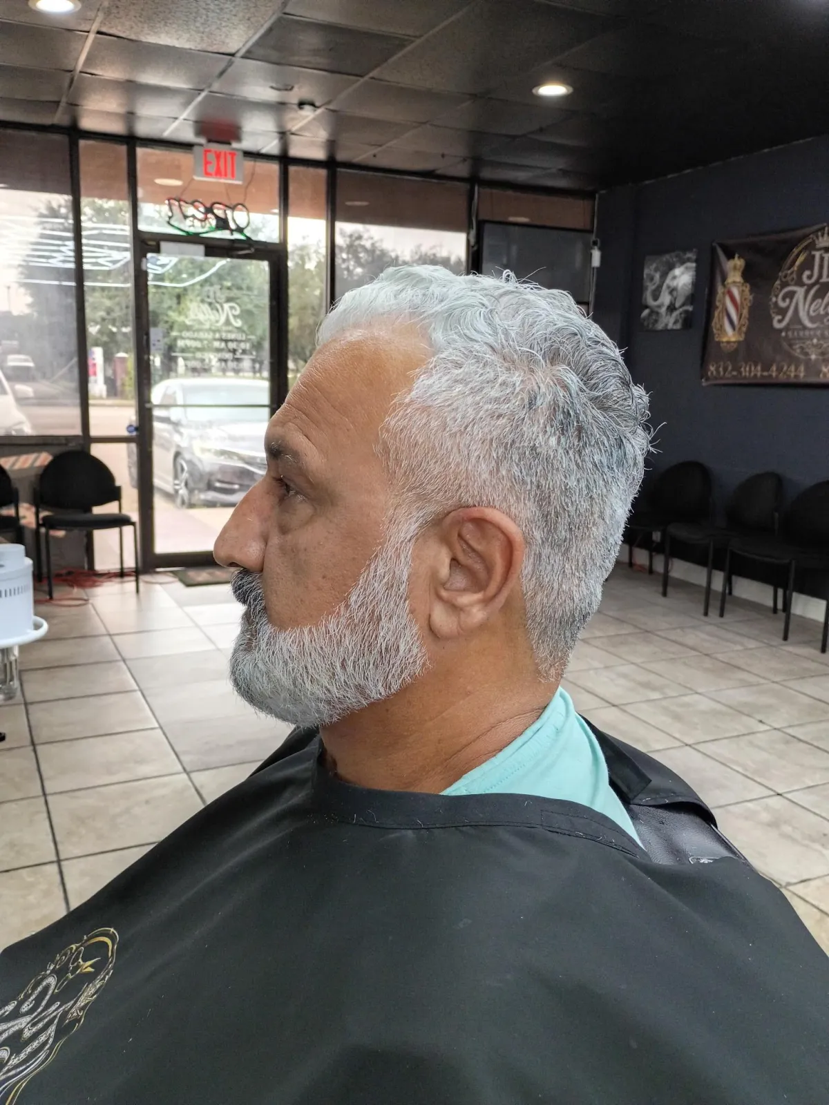 Master barber preparing tools for consultation
