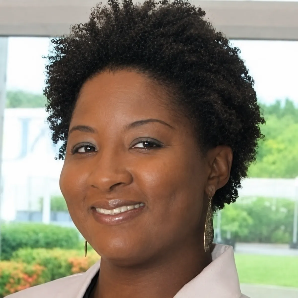 Professional headshot of Tradena N. Rayner, MS, RDN, CDN — bariatric and GLP-1 registered dietitian nutritionist and mindset coach known as “The Real Talk Nutritionist,” helping clients rebuild confidence, consistency, and peace after weight loss.