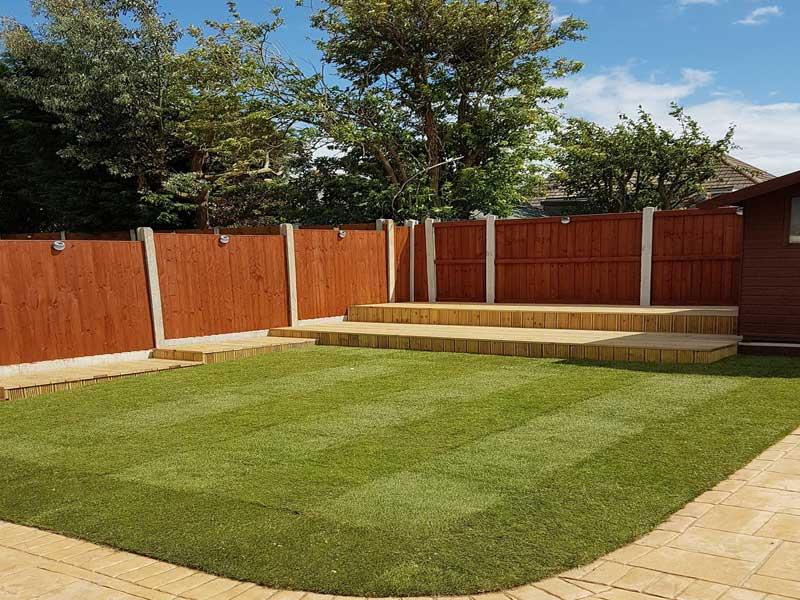 man wearing black virtual reality headset while painting near brown wall