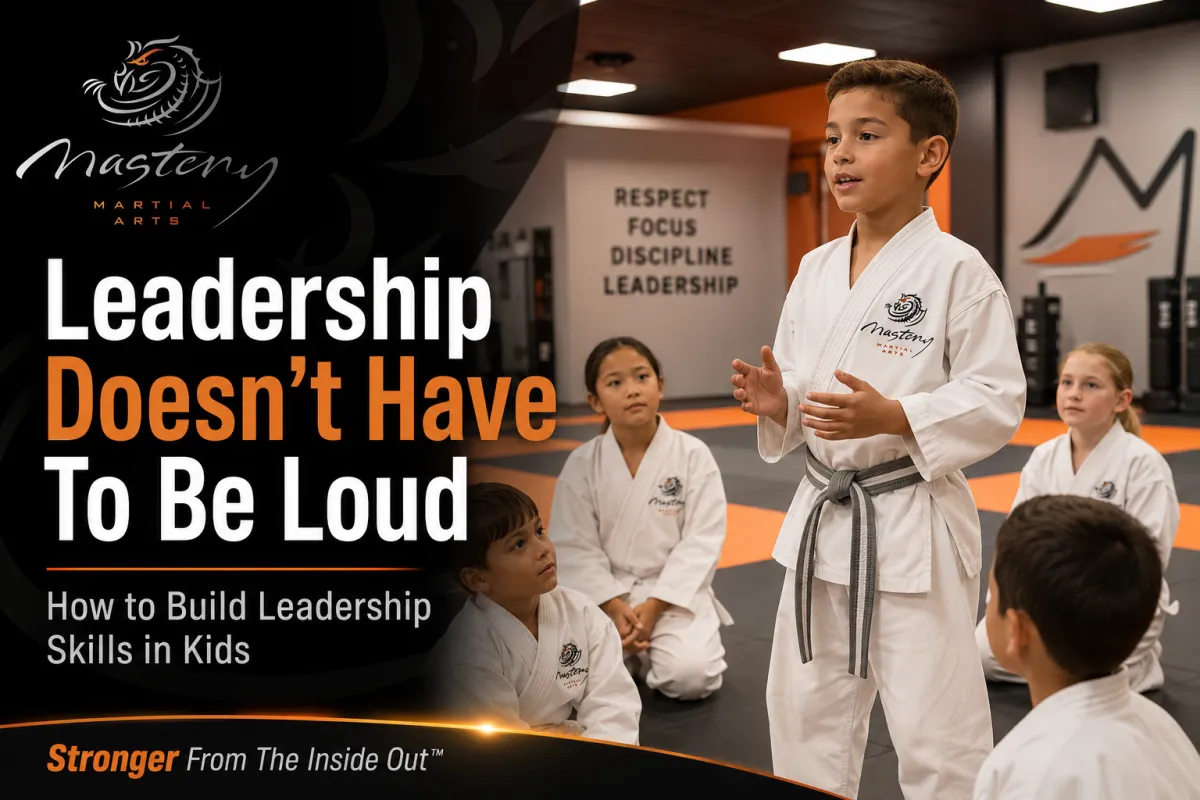 Confident Mastery Martial Arts student standing in front of classmates while practicing leadership skills.