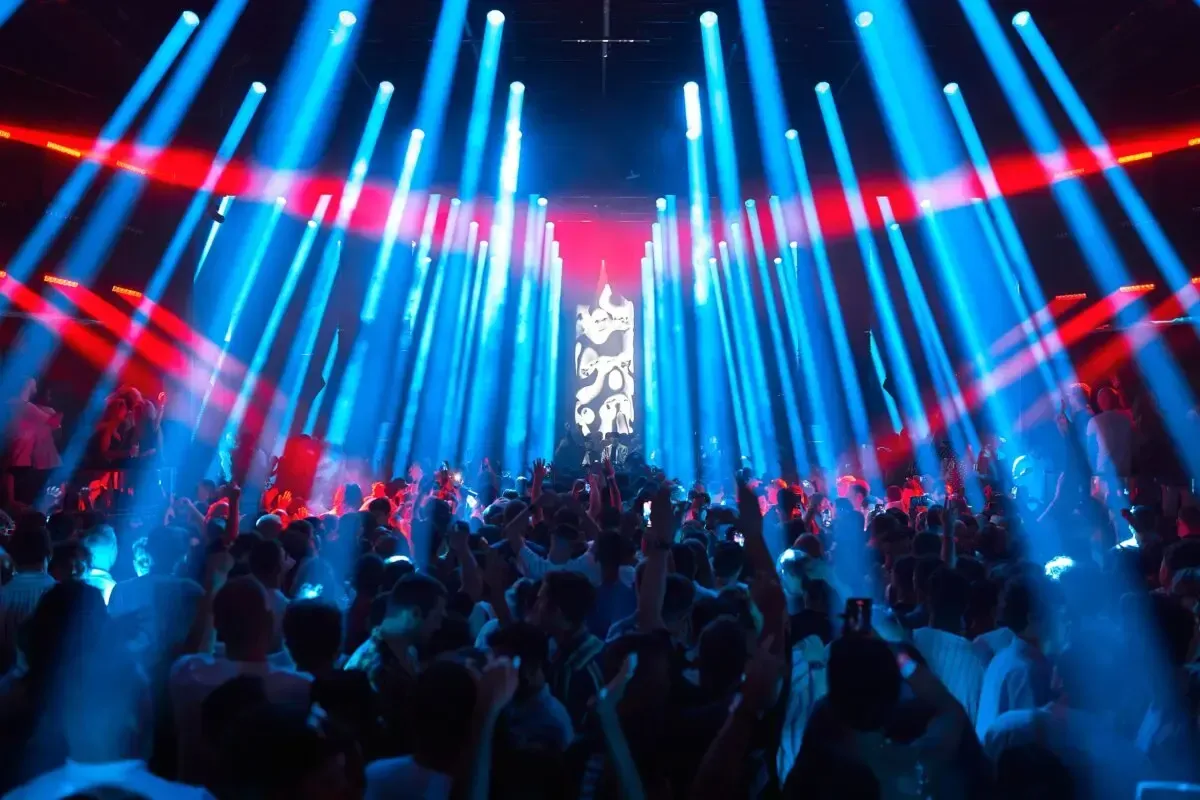 city buildings under gray clouds during sunset