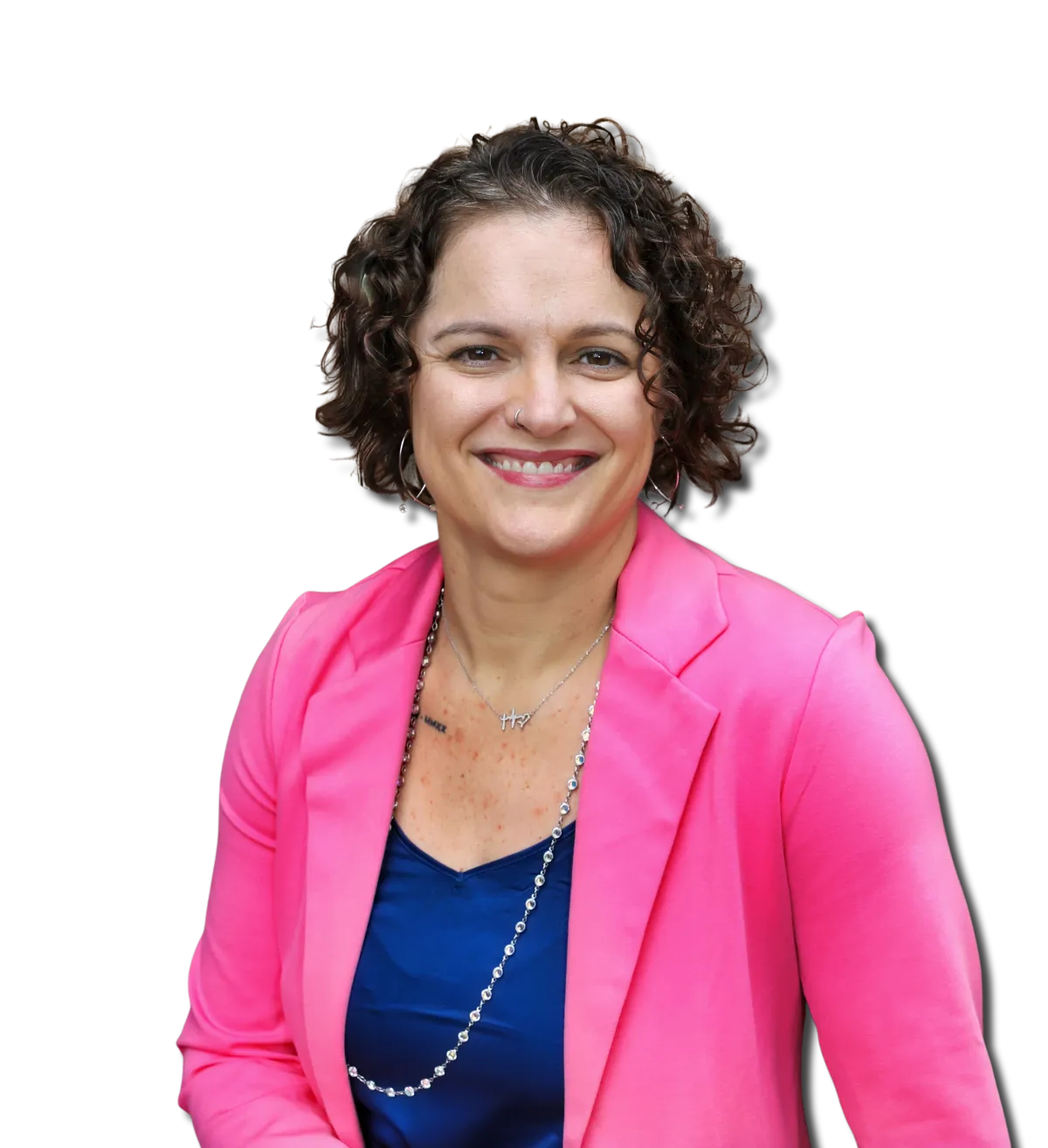 Mandy McGowan smiling in a pink blazer