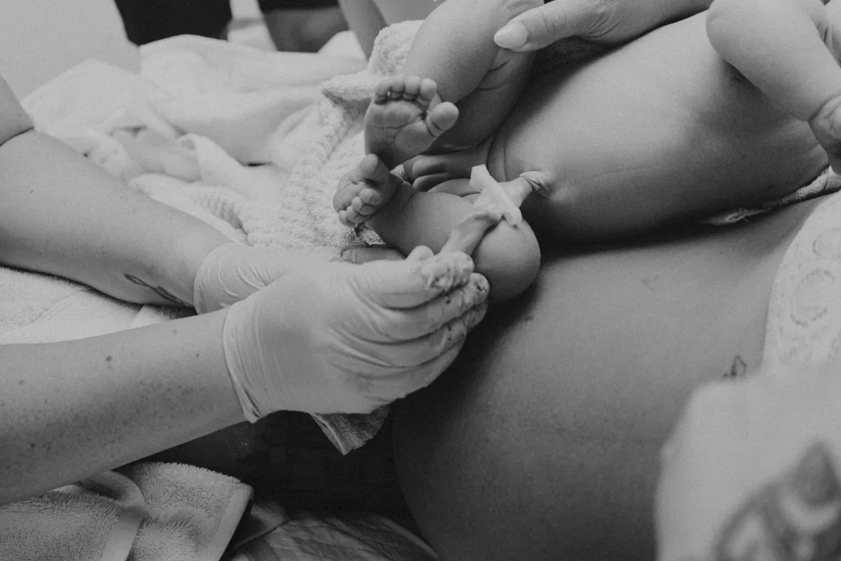 Newborn baby receiving gentle care immediately after birth