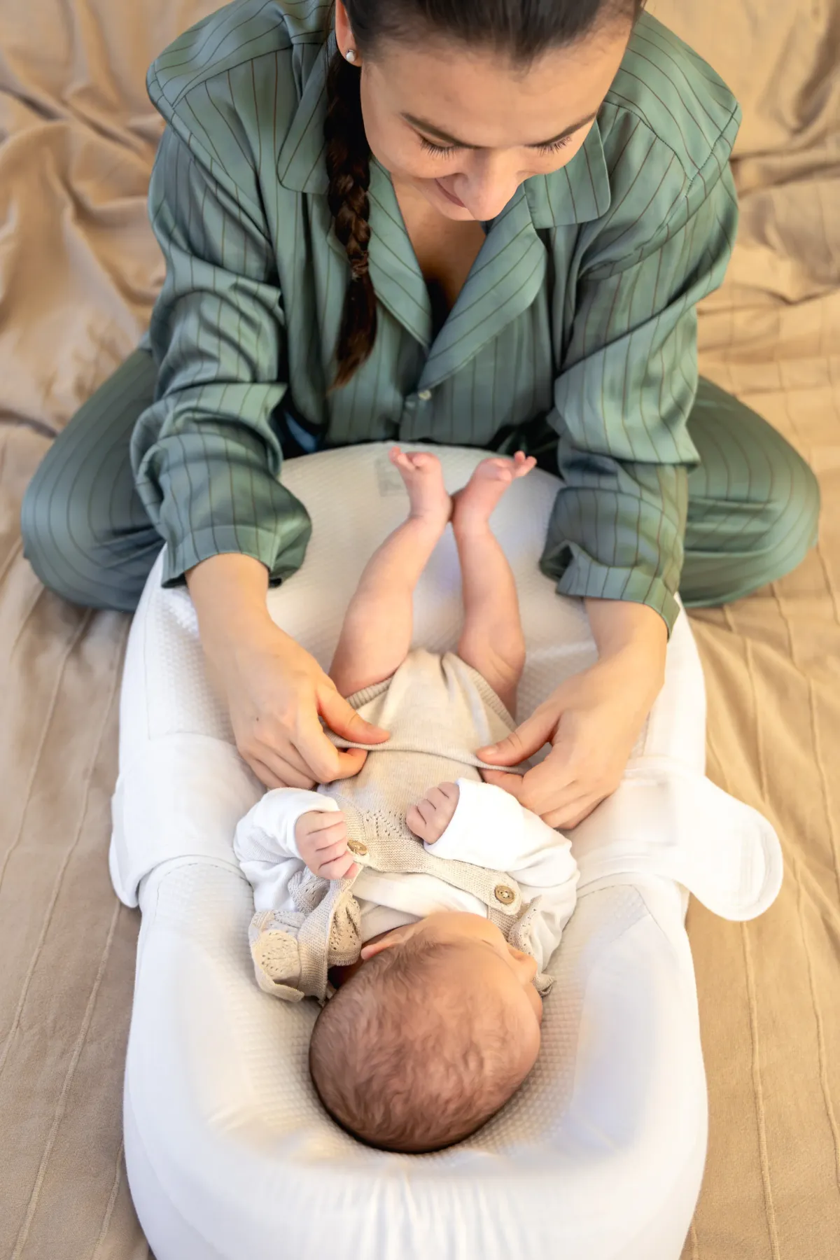 New mother caring for newborn baby during natural birth postpartum support in Newnan, GA