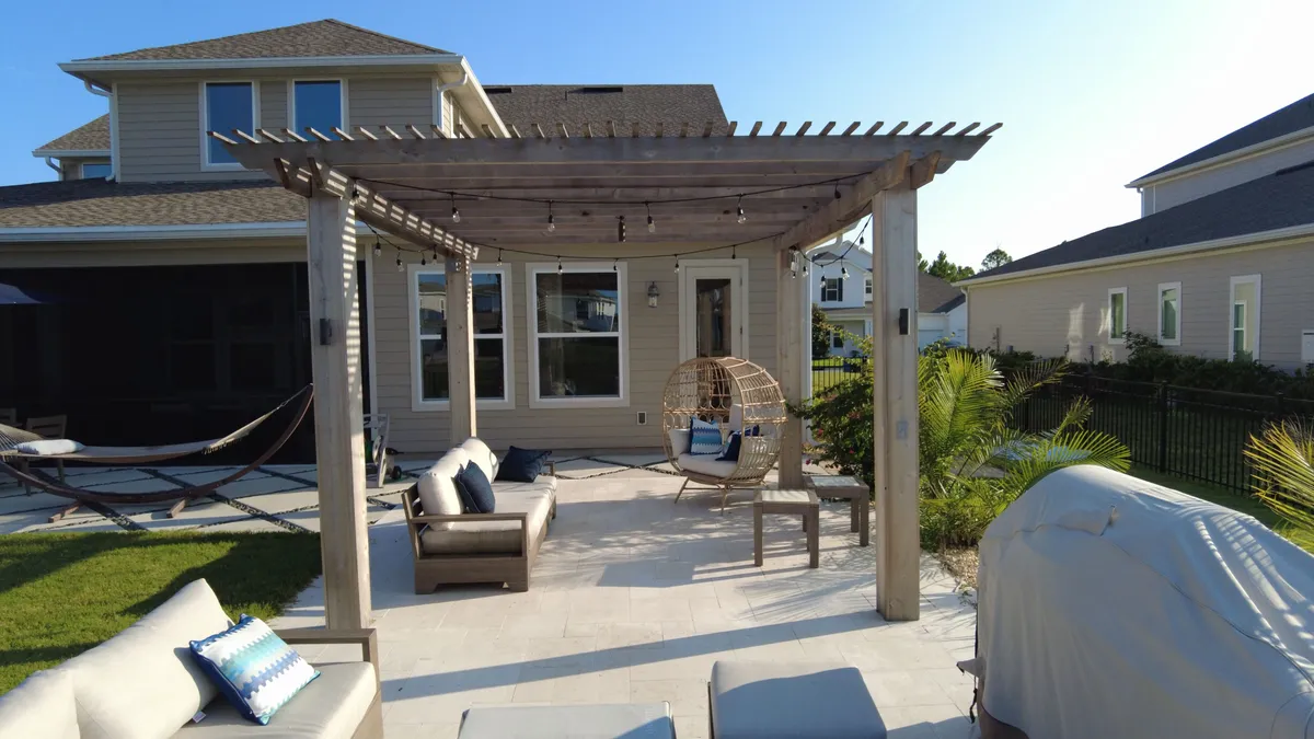 Buma Landscaping paver patio and pergola at the Antilla Way project