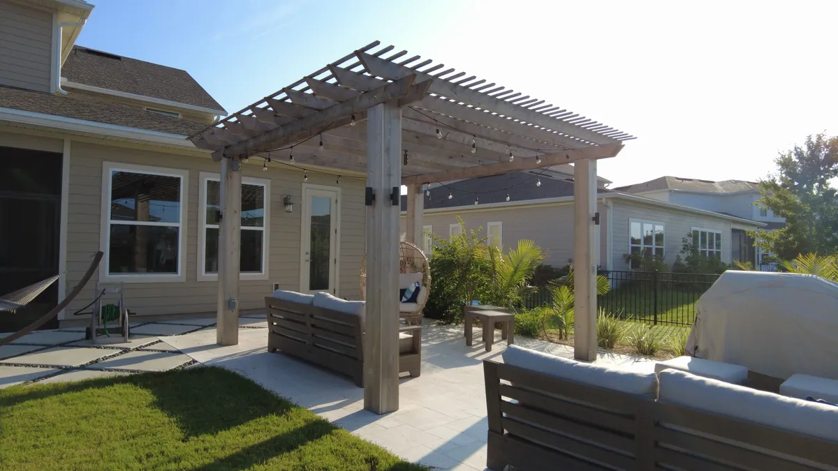 Paver patio and outdoor seating from Buma’s Antilla Way project