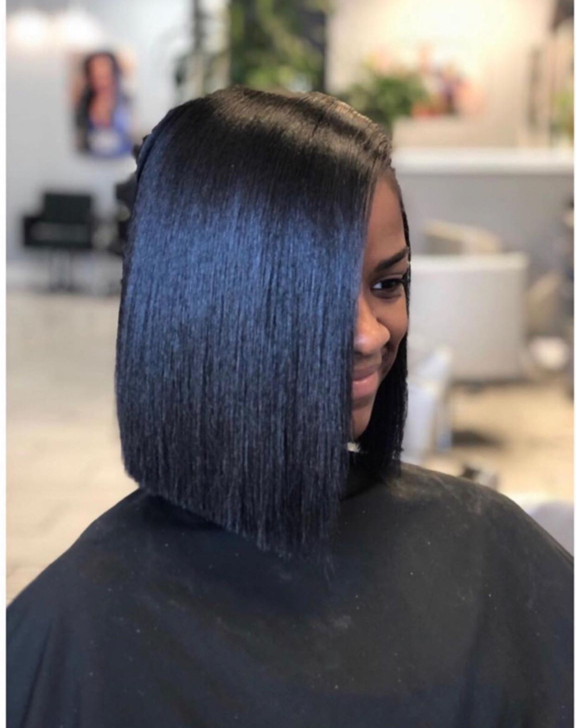 a living room filled with furniture and a fireplace