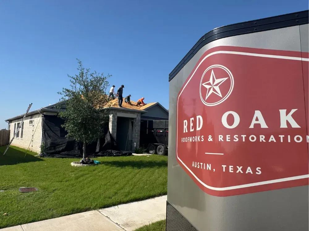 Red Oak Roofworks trailer at house roof repair site in Texas