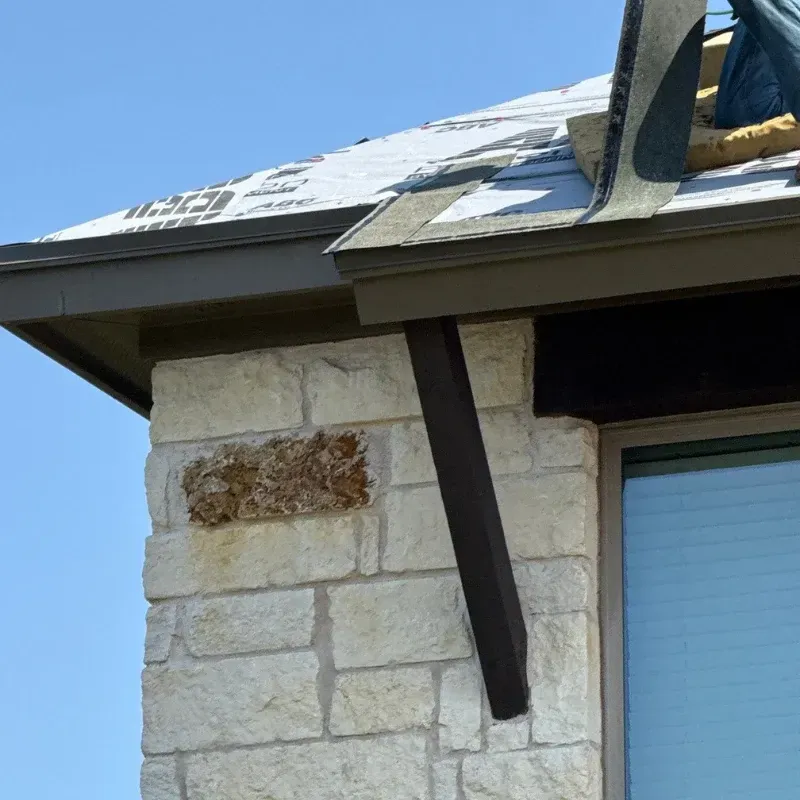 Roof edge installation with ABC Pro Guard 20 underlayment during residential roofing project.